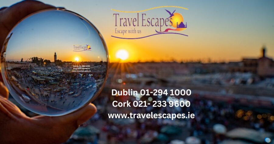 A hand holding a crystal ball reflecting a vibrant sunset over a bustling Moroccan marketplace, with the Travel Escapes logo and contact information below. Keywords: Travel Escapes, Morocco, Marrakech, sunset, marketplace, travel, adventure, Cruise Holidays, holiday, experience, crystal ball. Escorted Tours, Guided Holidays