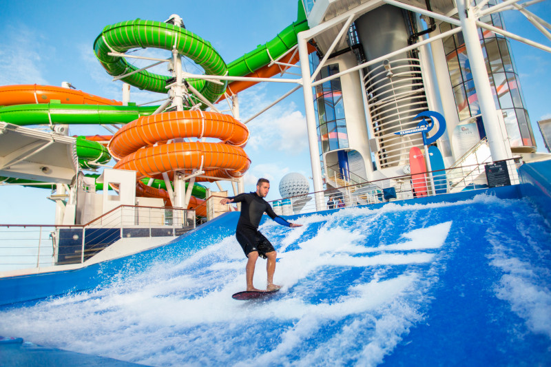 A person enjoying the Perfect Storm waterslide aboard the Liberty of the Seas cruise ship.