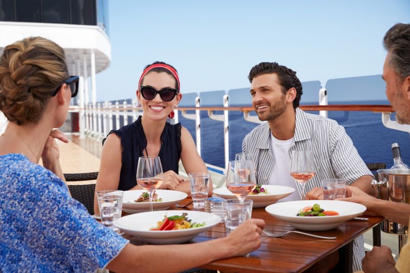 Cunard Life Onboard. Shows cruisers enjoying food and wine onboard. Transatlantic Cruise Travel Escapes and Tours